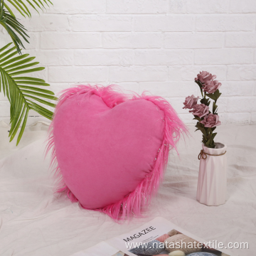 Plush silver silk heart-shaped pillow